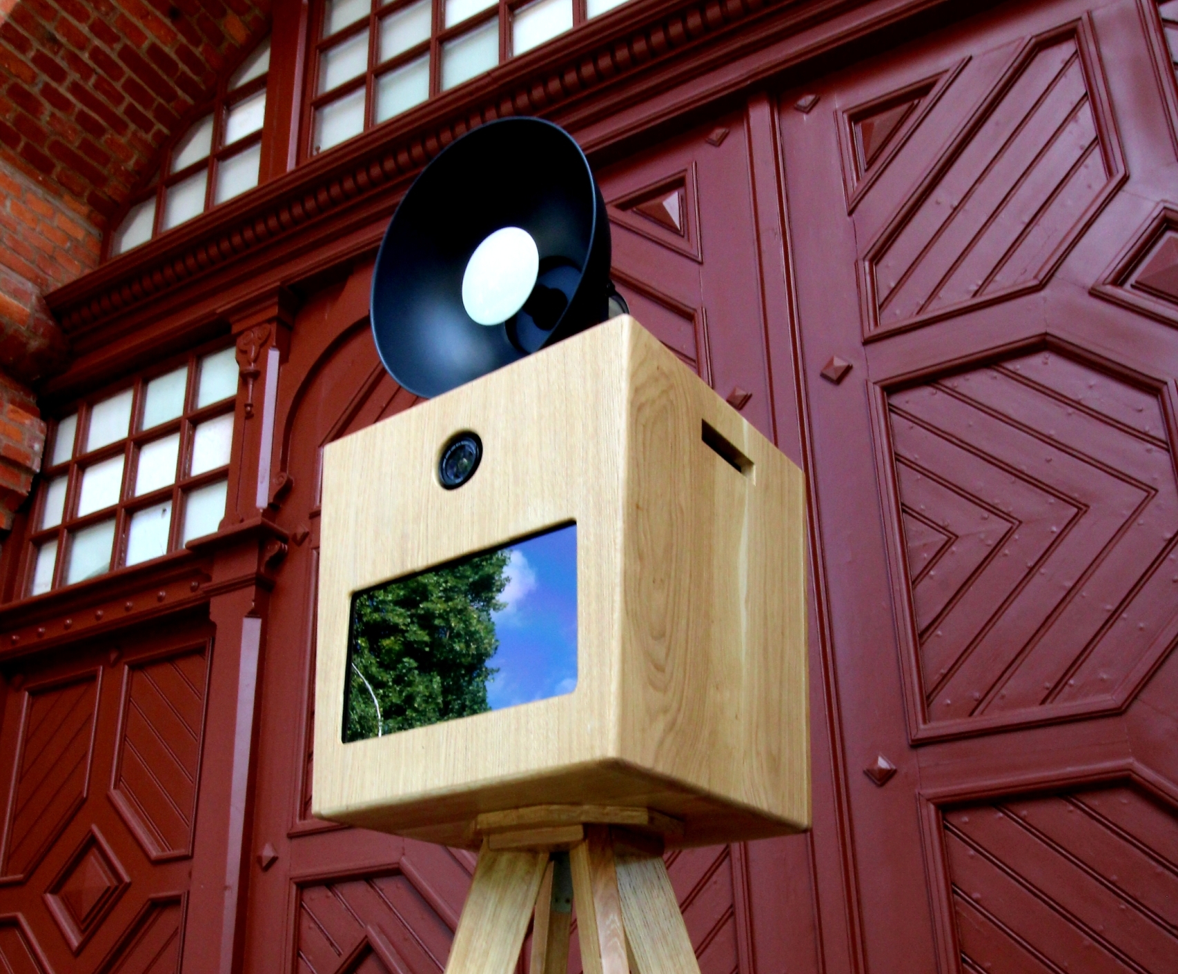 Woman Holding Cup Standing in the Kitchen